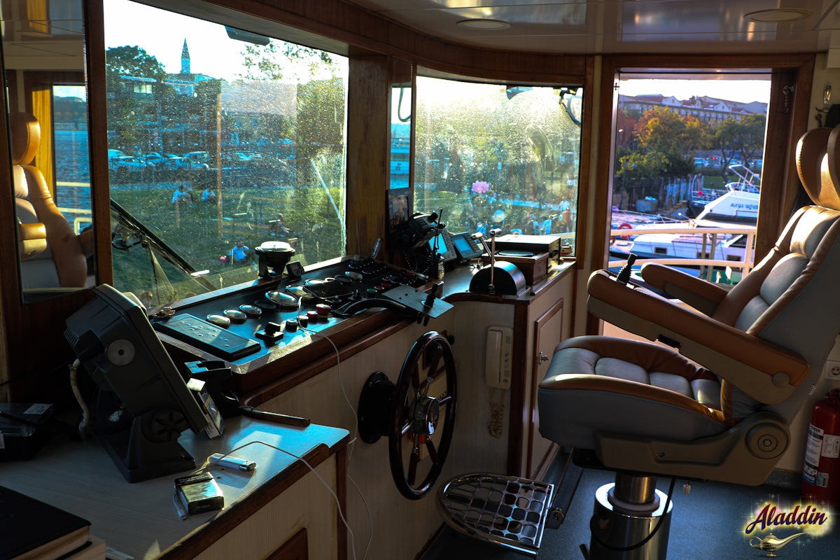 A living room with a lot of windows and furniture