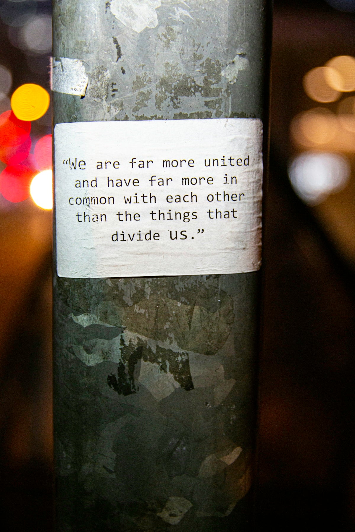 Quote on a pole about unity and commonality.